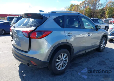 2015 Mazda Cx-5 Touring z USA, uszkodzony, nr VIN JM3KE2CY7F0528142